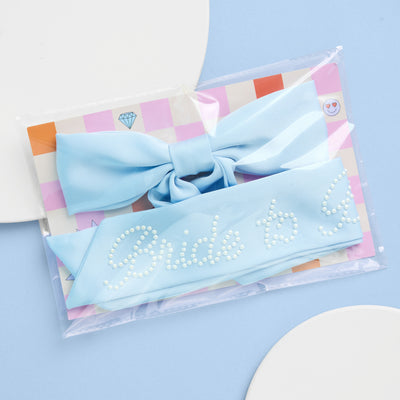 Bride To Be Pearl Bow - light blue satin + pearl logo