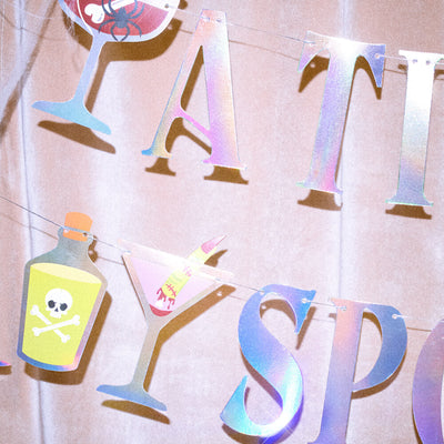 Tini Bit Spooky Banner - 6 ft iridescent banner