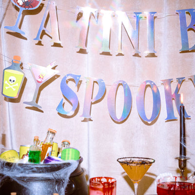 Tini Bit Spooky Banner - 6 ft iridescent banner