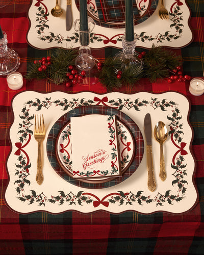 Christmas tree placemats arranged on a festive dinner table