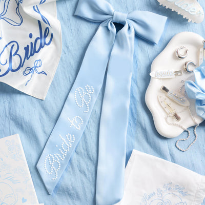 Bride To Be Pearl Bow - light blue satin + pearl logo