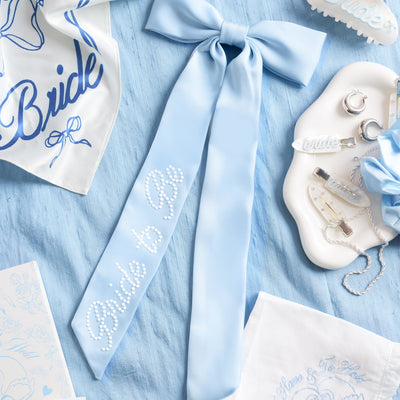 Bride To Be Pearl Bow - light blue satin + pearl logo