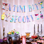 Tini Bit Spooky Banner - 6 ft iridescent banner