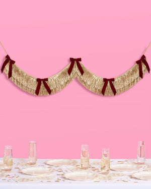 Gilded Bow Banner - layered fringe + velvet bows